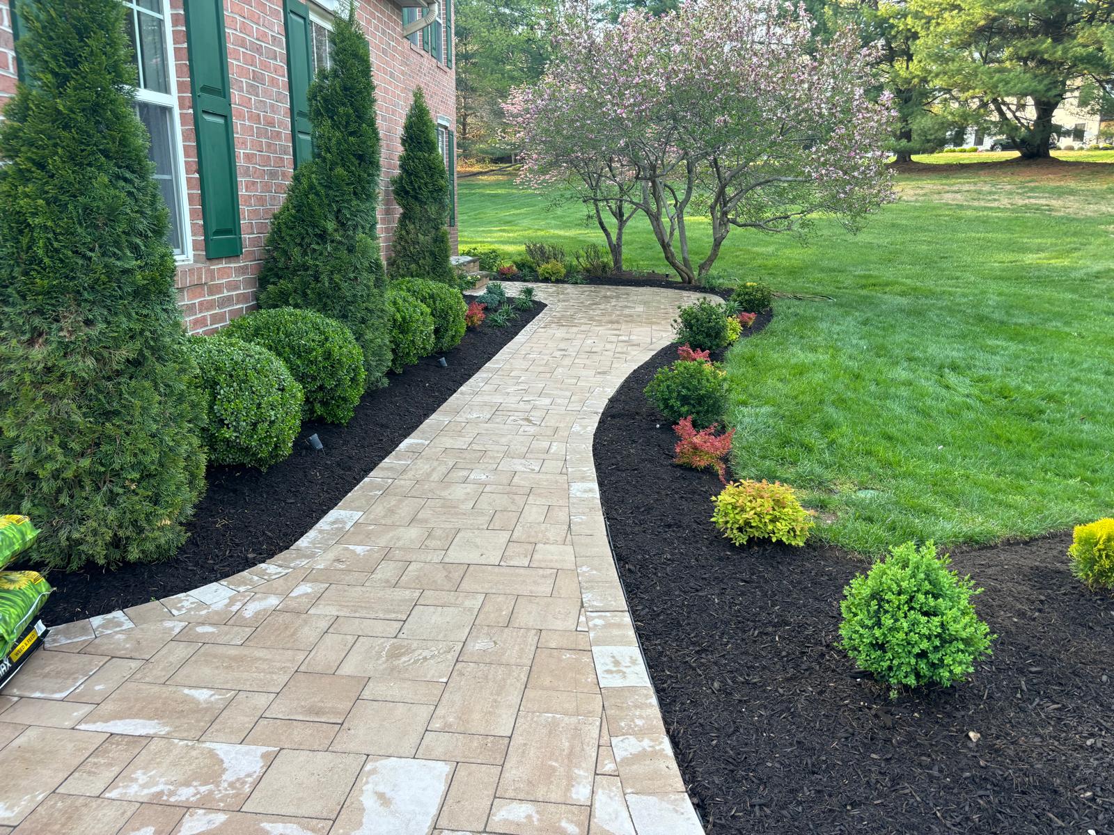 Paver walkway and landscape beds